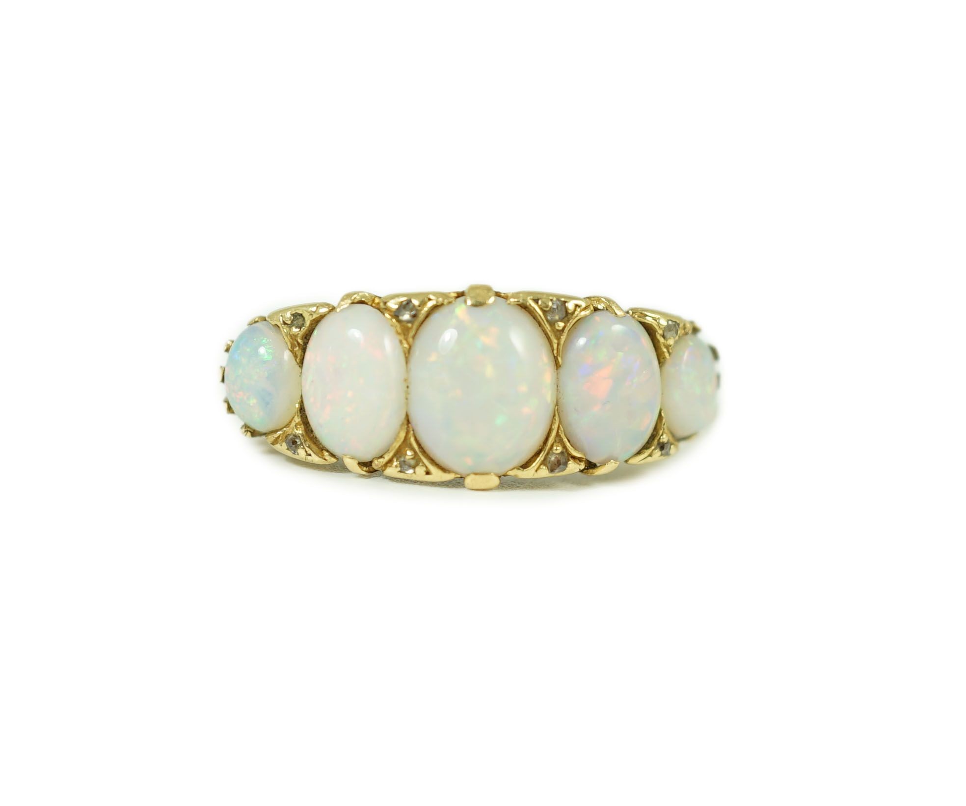 An 18ct gold and graduated five stone opal half hoop ring, with diamond chip spacers